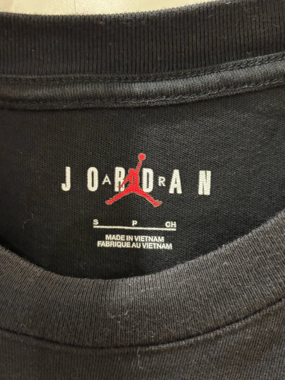 Jordan Black Short Sleeve Tee with Ringed Hands Graphic
